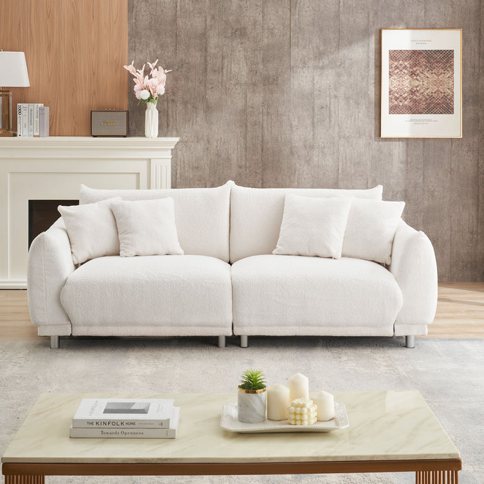 Teddy Wool Beige Sofa With Four Throw Pillows And Hardware Feet Can Sit Comfortably In An Apartment Bedroom Without Taking Up Space